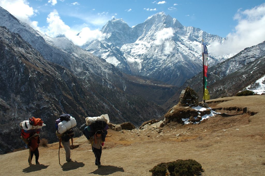 Sherpa helping climbers